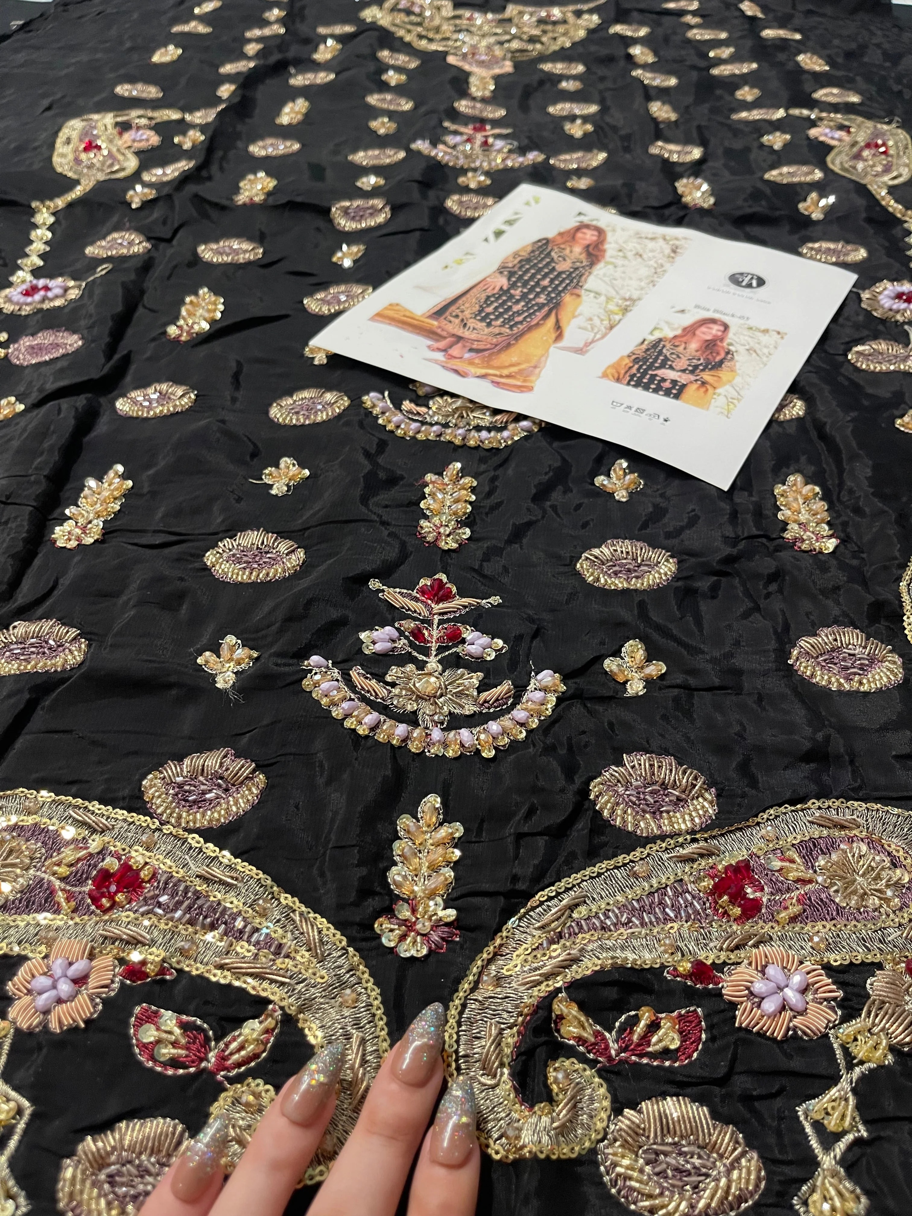Bita Black ensemble pakistani fashion outfit in black tones.
